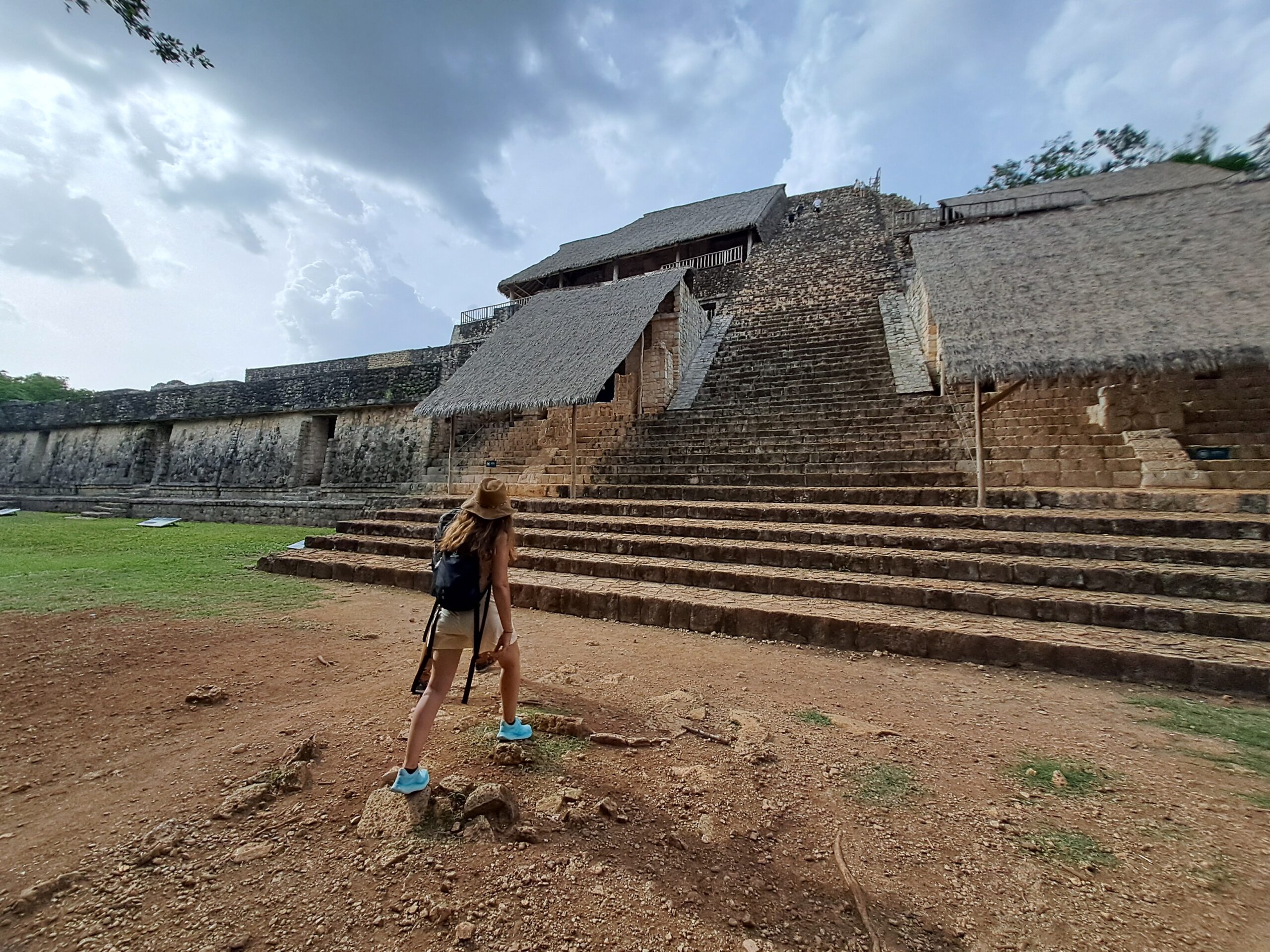 Ek Balam is an ancient Mayan archaeological site located in the Yucatán Peninsula, Mexico. Known for its impressive well-preserved ruins, Ek Balam offers a glimpse into the rich history and culture of the Mayan civilization. The image captures the grandeur of the site, showcasing the iconic Acropolis, a large pyramid that features detailed carvings and sculptures that tell stories of the ancient Mayan rulers. Surrounded by lush jungle, Ek Balam stands as a testament to the architectural and artistic achievements of the Mayan people. This site, less crowded than others in the region, offers visitors a unique opportunity to explore its history and enjoy the beauty of nature in a serene setting.
Ek Balam, Mayan ruins, Yucatán, archaeological site, Acropolis, Mayan civilization, Yucatán tourism, ancient pyramids, Ek Balam history, Mayan art and architecture, off-the-beaten-path destinations, Mexico tourist attractions.
